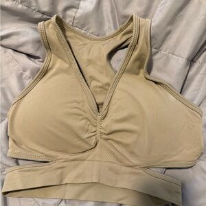 Alphalete Cutout V-Neck Sports Bra in Taupe